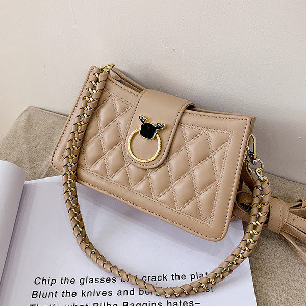 Modern női táska eko bőrből, fém rögzítéssel