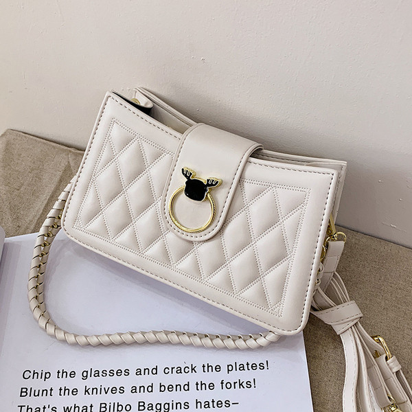 Modern női táska eko bőrből, fém rögzítéssel