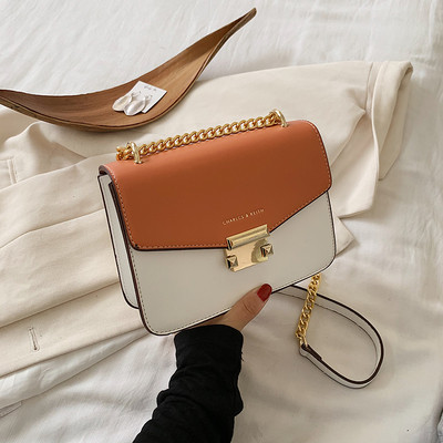 Öko bőrből készült modern női táska hosszú lánccal több színben