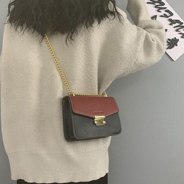 Öko bőrből készült modern női táska hosszú lánccal több színben