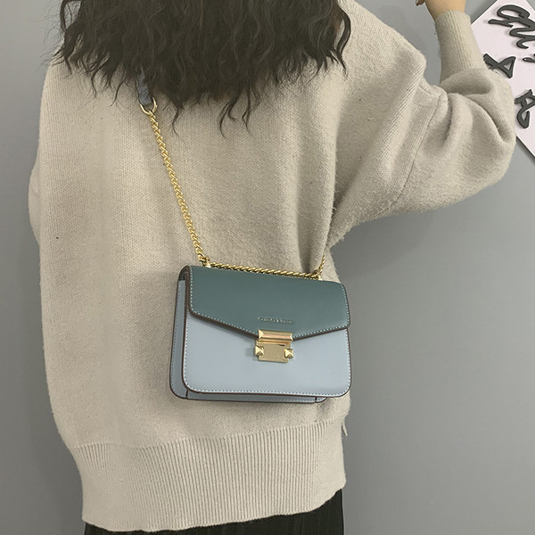 Öko bőrből készült modern női táska hosszú lánccal több színben