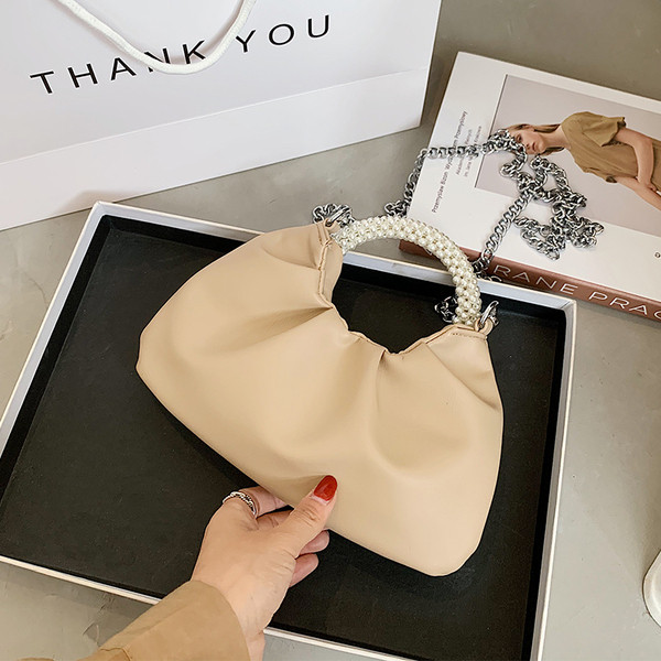 Eko bőrből készült modern női táska rövid fogantyúval és gyöngyökkel