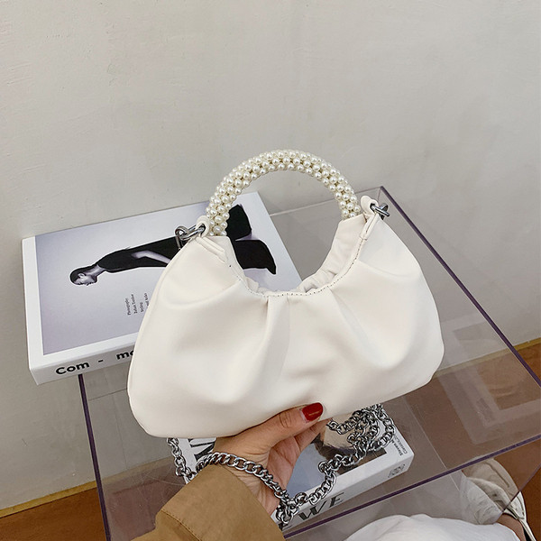 Eko bőrből készült modern női táska rövid fogantyúval és gyöngyökkel