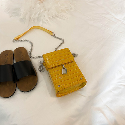 Modern női táska hosszú fém fogantyúval több színben