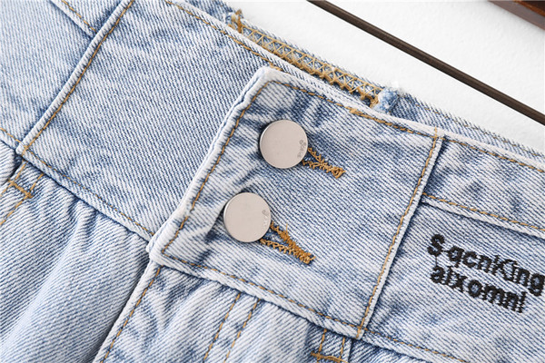 Női alkalmi farmer, szakadt motívumokkal