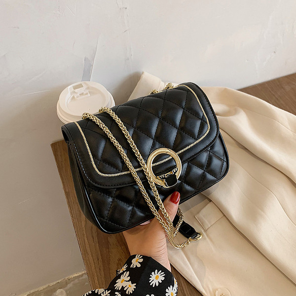 Moodne metallist kinnitusega naiste kott - ökonahk