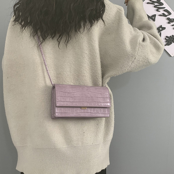 Γυναικεία έκο δερμάτινη τσάντα με μακριά λαβή και μεταλλική στερέωση