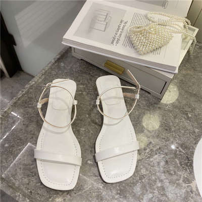 Ležerne sandale s kožnim remenom i niskom petom