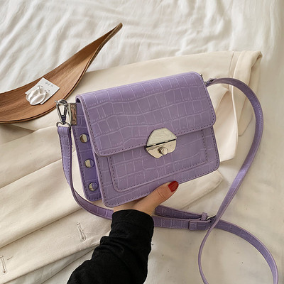 Ženska kožna torba s dugom ručkom i metalnom kopčom