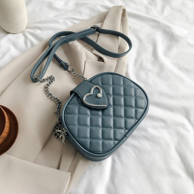 Κομψή γυναικεία έκο δερμάτινη τσάντα με μακριά αλυσίδα