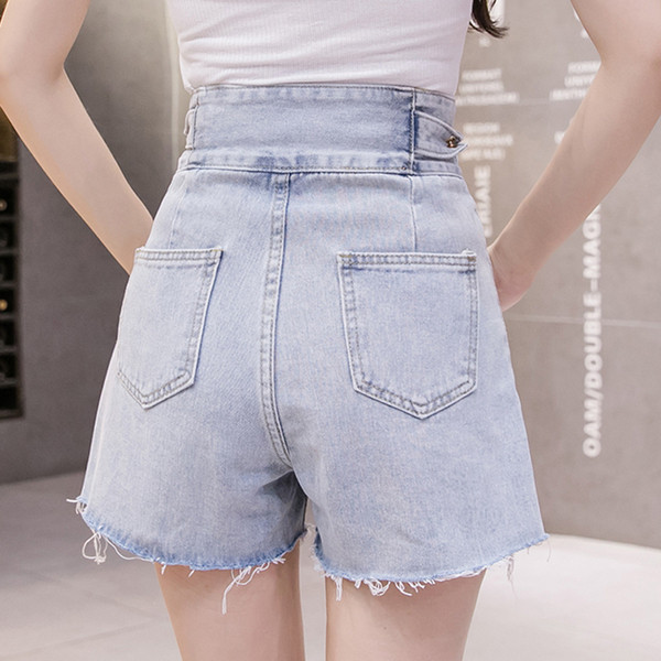 Női farmer rövidnadrág - magas derékkal, szakadt motívumokkal