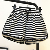 Női alkalmi csíkos nadrág elasztikus derékkal és megkötővel