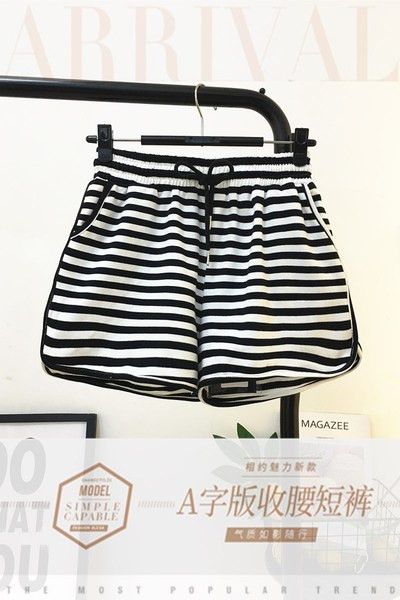 Női alkalmi csíkos nadrág elasztikus derékkal és megkötővel