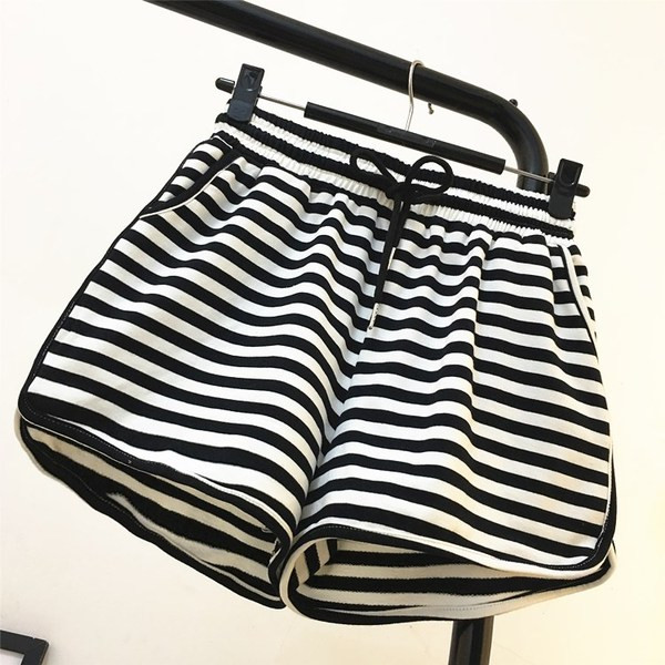 Női alkalmi csíkos nadrág elasztikus derékkal és megkötővel