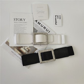 Široki elastični pojas s metalnom kopčom i ukrasnim kamenčićima