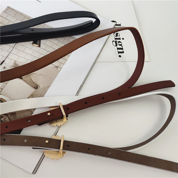 Öko bőrből készült vékony női öv margarétával