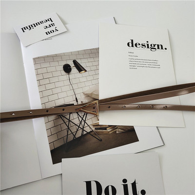 Vékony női bőr öv fém háromszöggel