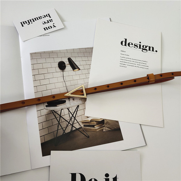 Vékony női bőr öv fém háromszöggel