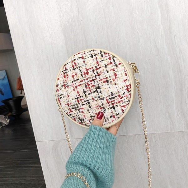 Új modell kis női táska fém lánccal, kerek formában