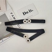 Vékony női elasztikus öv fém elemes virágokkal