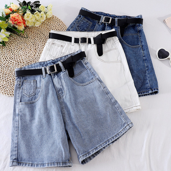 Naiste teksapüksid, millel on vöö ja kõrge vöökoht