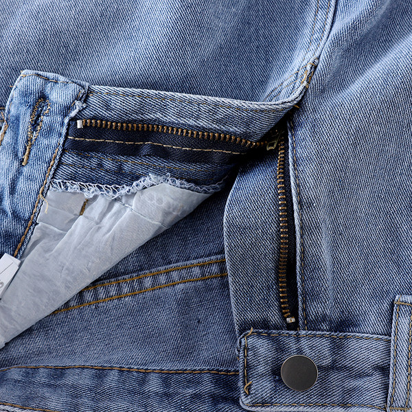 Naiste teksapüksid, millel on vöö ja kõrge vöökoht