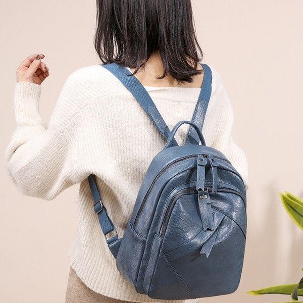 Uue mudeli kunstnahast lukuga naiste seljakott