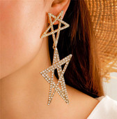 Női lógó fülbevaló arany színű és csillag alakú kövekkel