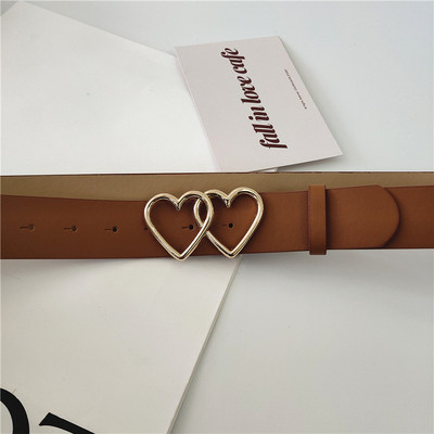 Női bőr öv fém szívecskékkel