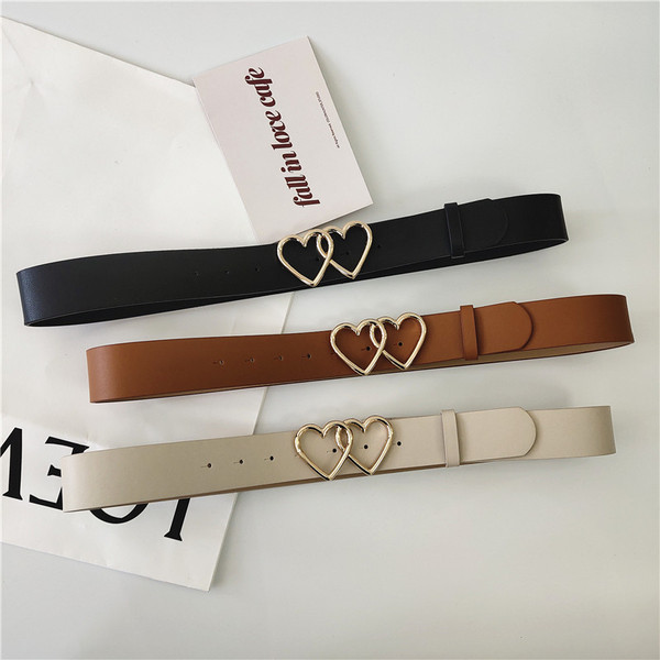 Női bőr öv fém szívecskékkel