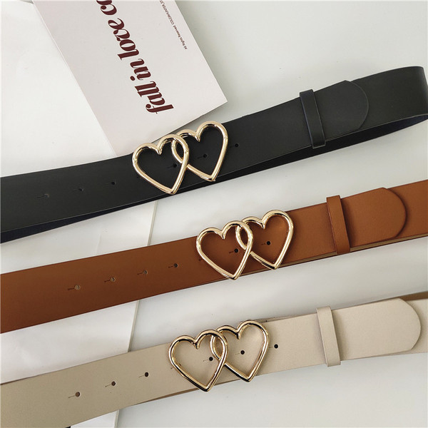 Női bőr öv fém szívecskékkel