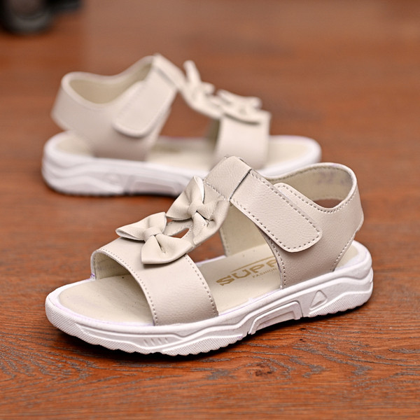 Alkalmi gyerekszandál szalaggal és szalagokkal