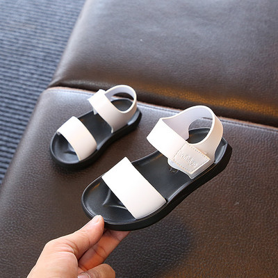 Изчистен модел детски сандали с лепенка в два цвята 