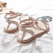 Alkalmi női szandál lapos talppal és szalaggal, két színben