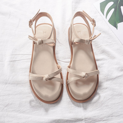 Alkalmi női szandál lapos talppal és szalaggal, két színben