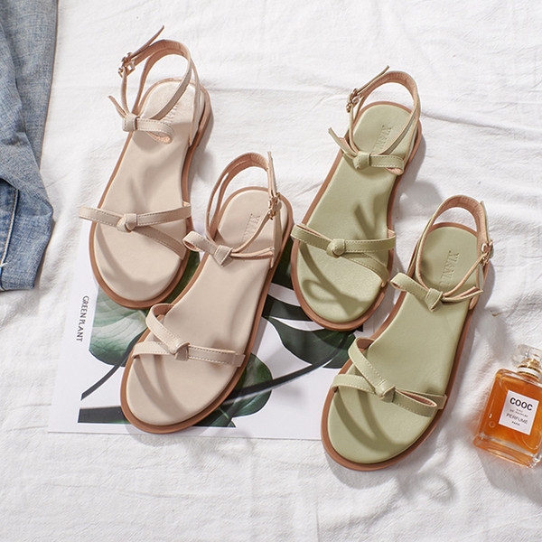 Alkalmi női szandál lapos talppal és szalaggal, két színben