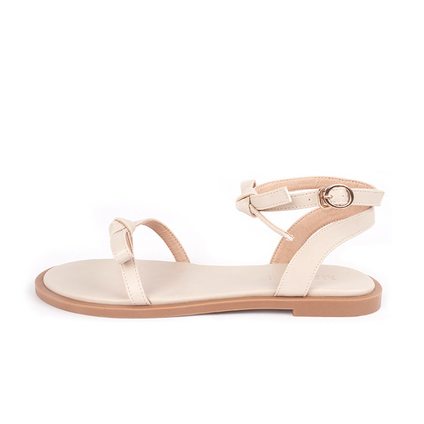 Alkalmi női szandál lapos talppal és szalaggal, két színben