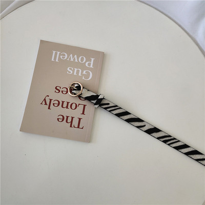 Vékony női öv jobb oldali zebrával