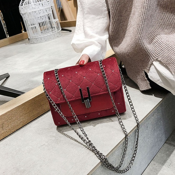 Γυναικεία τσάντα νέο μοντέλο από οικολογικό δέρμα με πούλιες