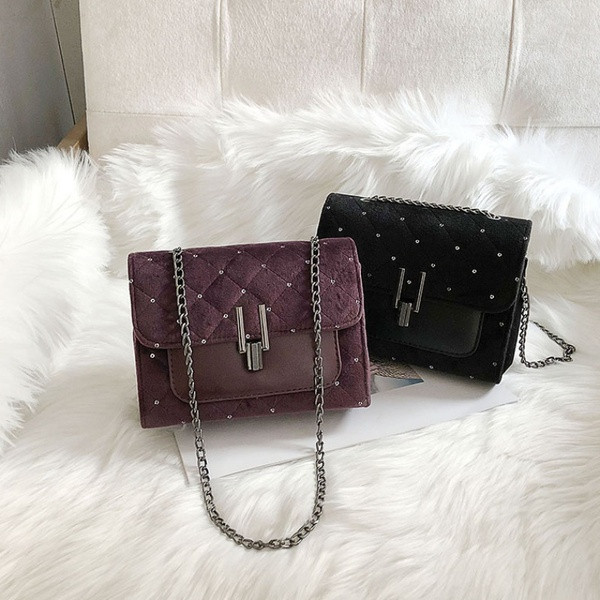 Γυναικεία τσάντα νέο μοντέλο από οικολογικό δέρμα με πούλιες