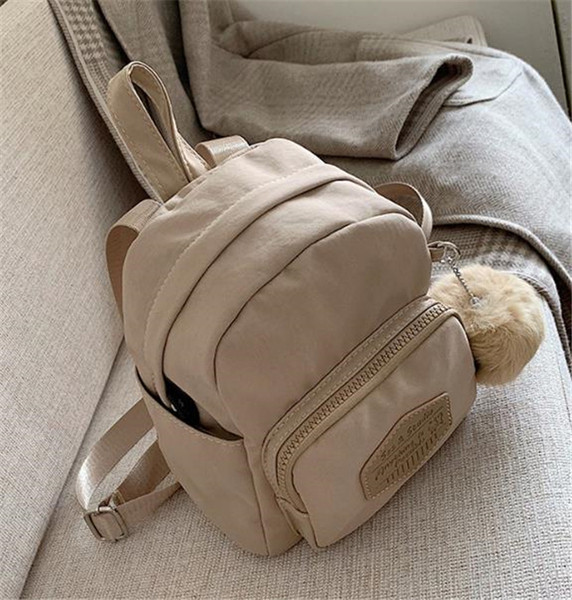 Sieviešu maza tekstila mugursoma ar dūnām