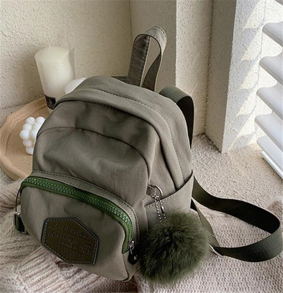 Sieviešu maza tekstila mugursoma ar dūnām