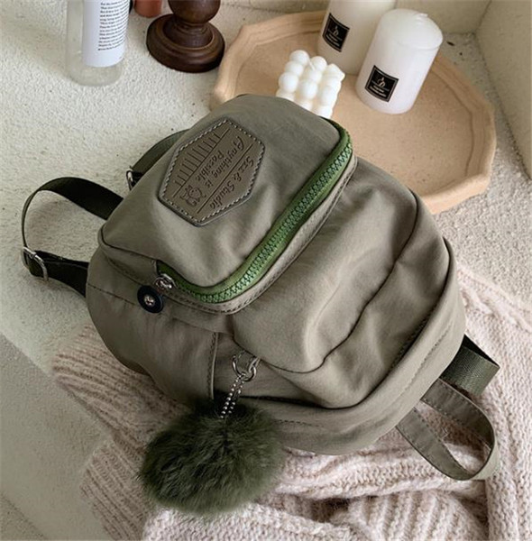 Sieviešu maza tekstila mugursoma ar dūnām