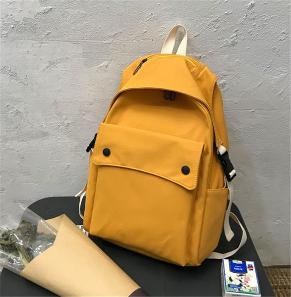 Női textil hátizsák nagy első zsebbel