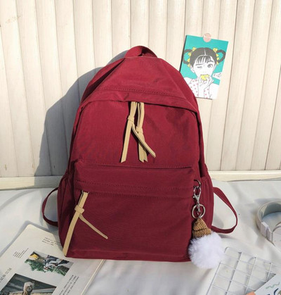 Ženski tekstilni ruksak s patentnim zatvaračima