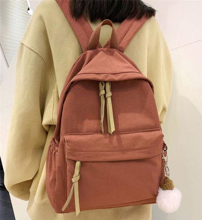 Ženski tekstilni ruksak s patentnim zatvaračima