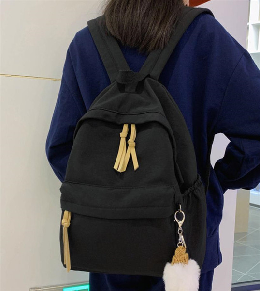 Ženski tekstilni ruksak s patentnim zatvaračima