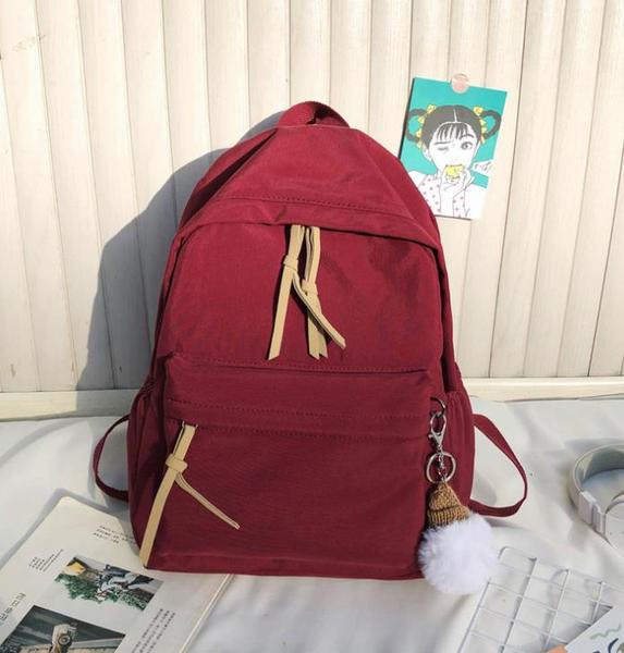 Ženski tekstilni ruksak s patentnim zatvaračima