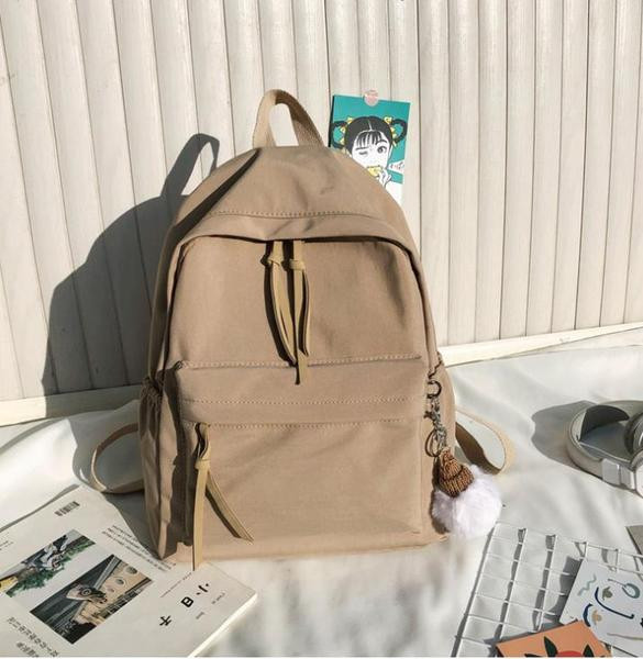 Ženski tekstilni ruksak s patentnim zatvaračima