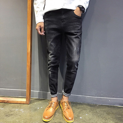 Férfi tavaszi-őszi farmernadrág szakadt motívumokkal